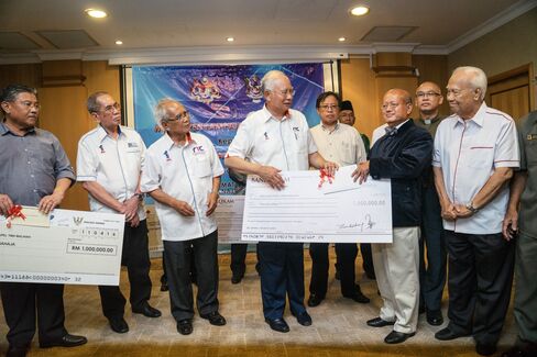 Najib Razak at at a cheque presentation ceremony in Sarawak in April 2016.