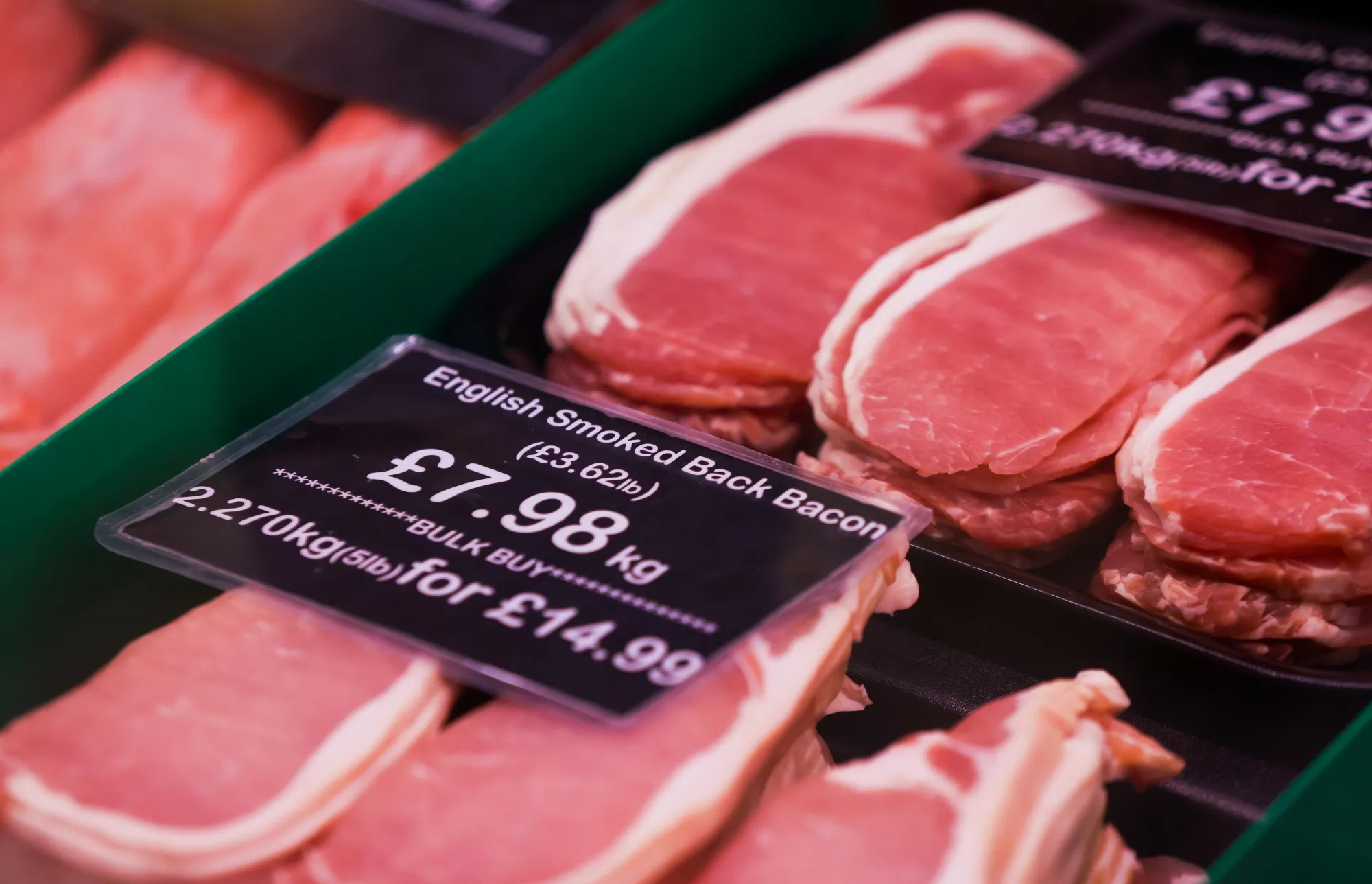 Cuts of bacon for sale at a butcher in London.