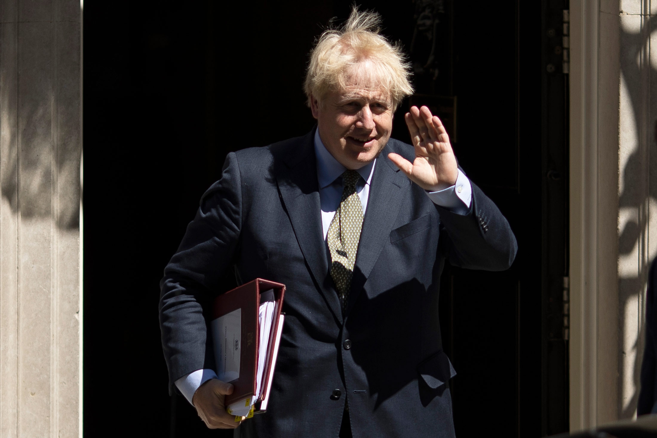 Boris Johnson leaves 10 Downing Street in London on July 22.