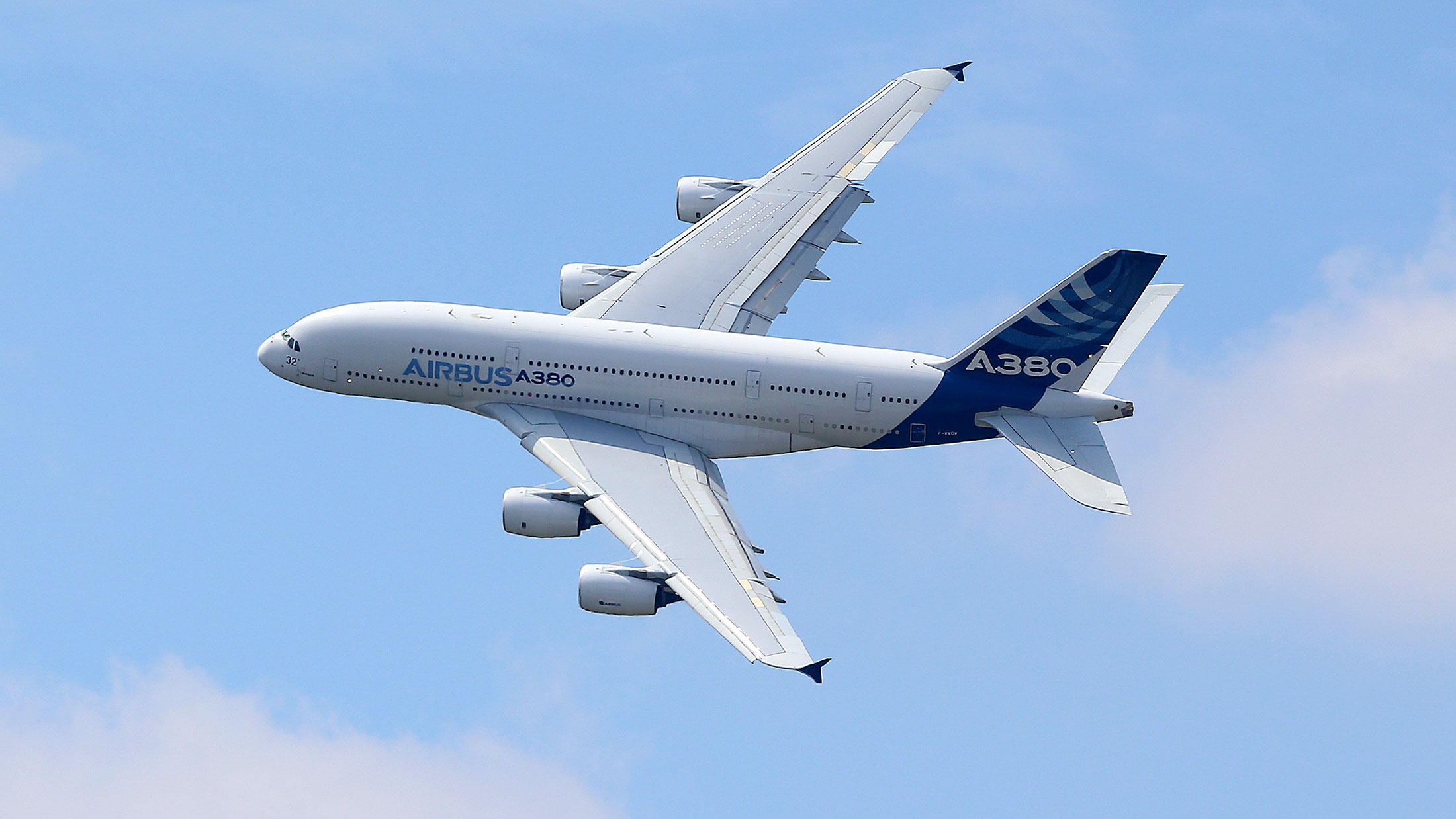 An Airbus SAS A380 super jumbo performs a flying display on day two of the 51st International Paris Air Show in Paris, France, on June 16, 2015.
