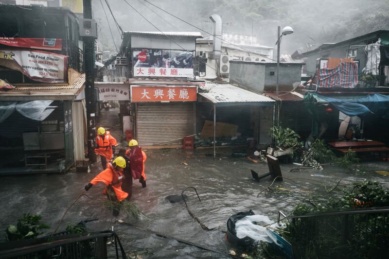 Firefighters Escort People Through Floodwaters During A No Hurricane Signal In Hong Kong On Sept Photographer Anthony Kwan Bloomberg Firefighters Escort People Through Floodwaters During A No Hurricane Signal In Hong Kong On Sept Photographer Anthony Kwan Bloomberg