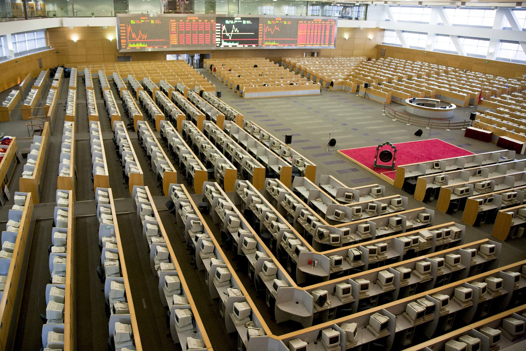 Employees work on the trading floor of the Shanghai Stock Exchange in Shanghai, China.
