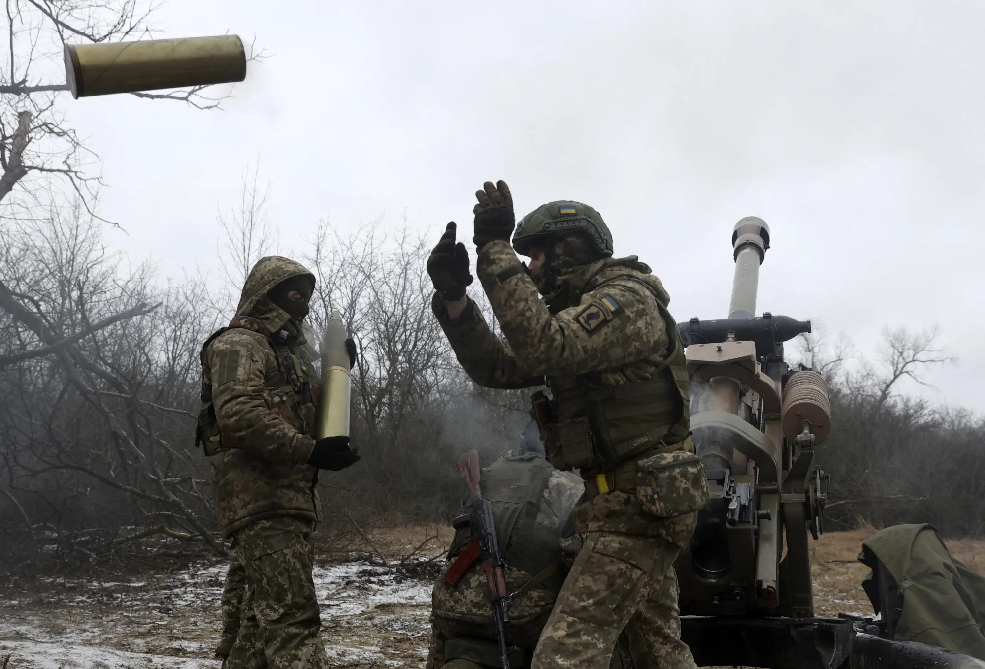 Ukrainian artillerymen fire towards Russian positions on the front line in Lugansk region, Ukraine.