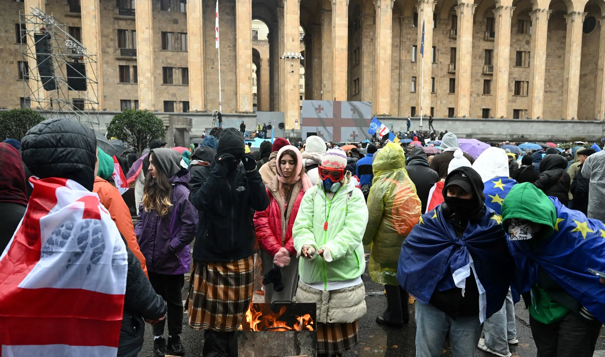 Protestors gather in front of the Georgian Parliament, amid the first session of the new parliament, in Tbilisi on Nov. 25.