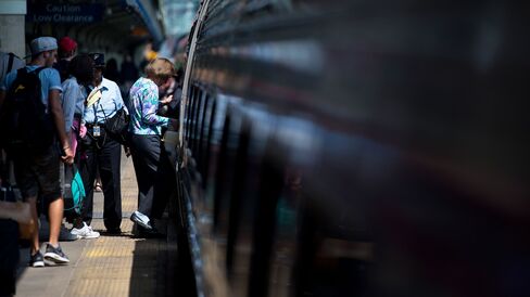 Passengers board an Amtrak Northeast Regional train at Union Station in Washington, D.C.