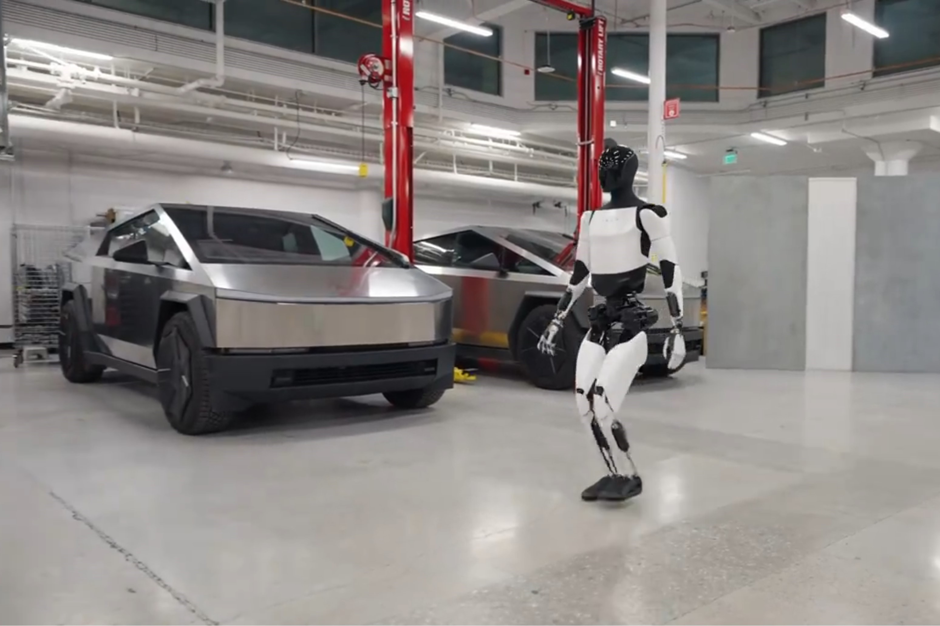 Tesla Optimus Gen 2: New Video Shows Dancing Robot, Better Movement,  Updates - Bloomberg