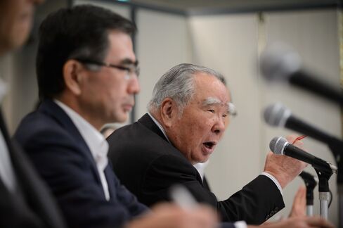 Toshihiro Suzuki And Osamu Suzuki