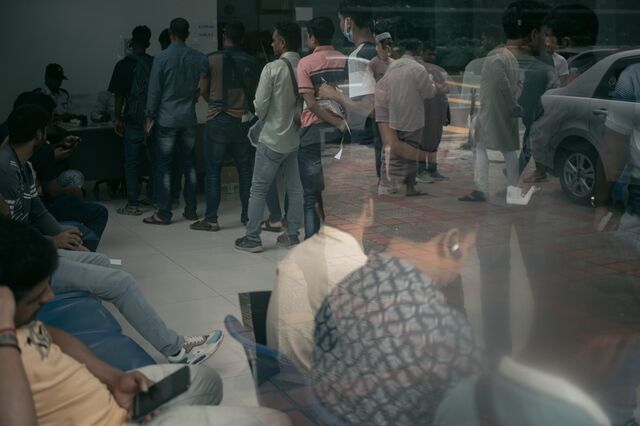 People line up for consular services at Bangladesh's High Commission in Kuala Lumpur, Malaysia, on May 30, 2025. Photographer: Samsul Said/Bloomberg
