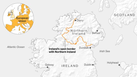 May to Reaffirm Brexit Vow in Belfast Talk: No Hard Irish Border