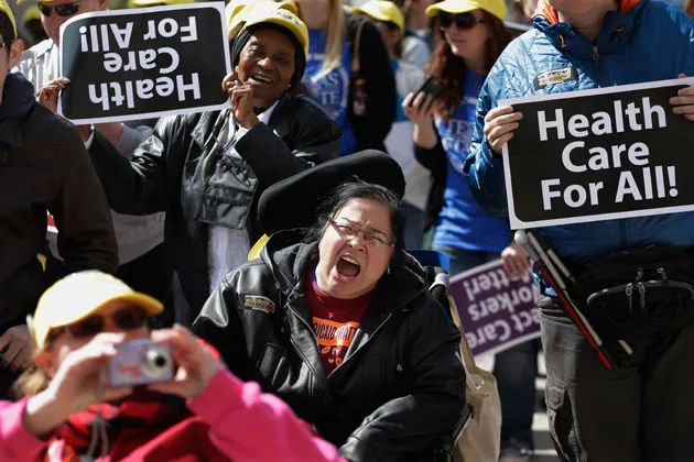 Protesters march in Austin, Tex., on March 5, demanding that lawmakers expand Medicaid to include an additional 1.5 million poor people