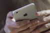 A customer looks at an Apple Inc. iPhone 6s Plus at an Apple store in Palo Alto, California, U.S.