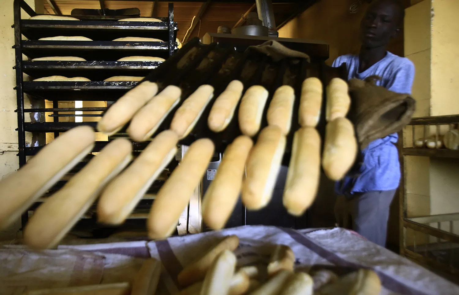 A Sudanese man works at a bakery in the capital Khartoum on Jan. 5, 2018.