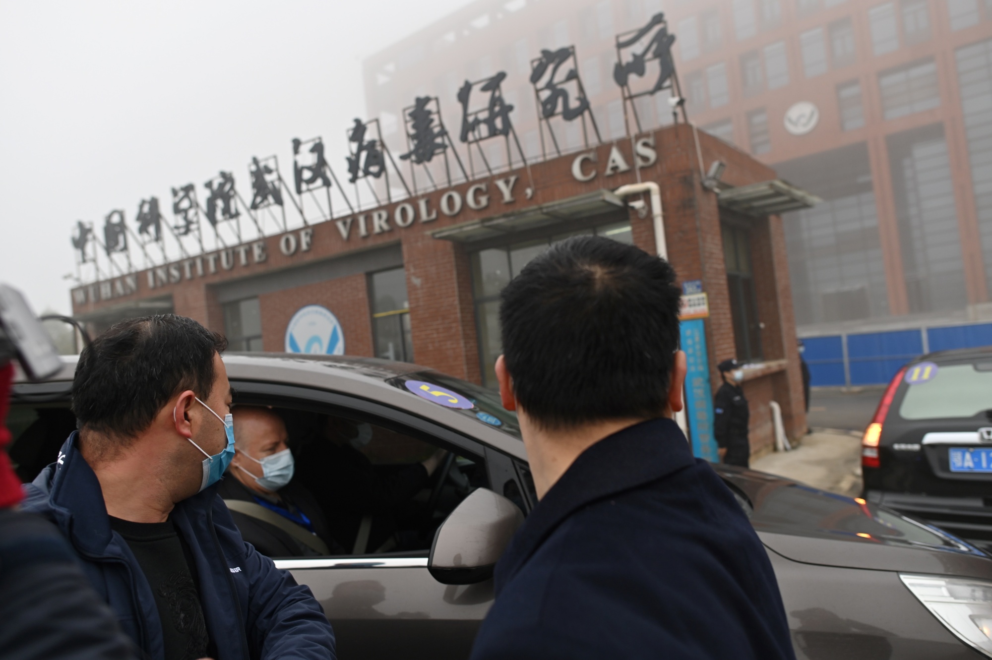 Who Experts Visit Wuhan Lab At Center Of Virus Conspiracy Theory Bloomberg