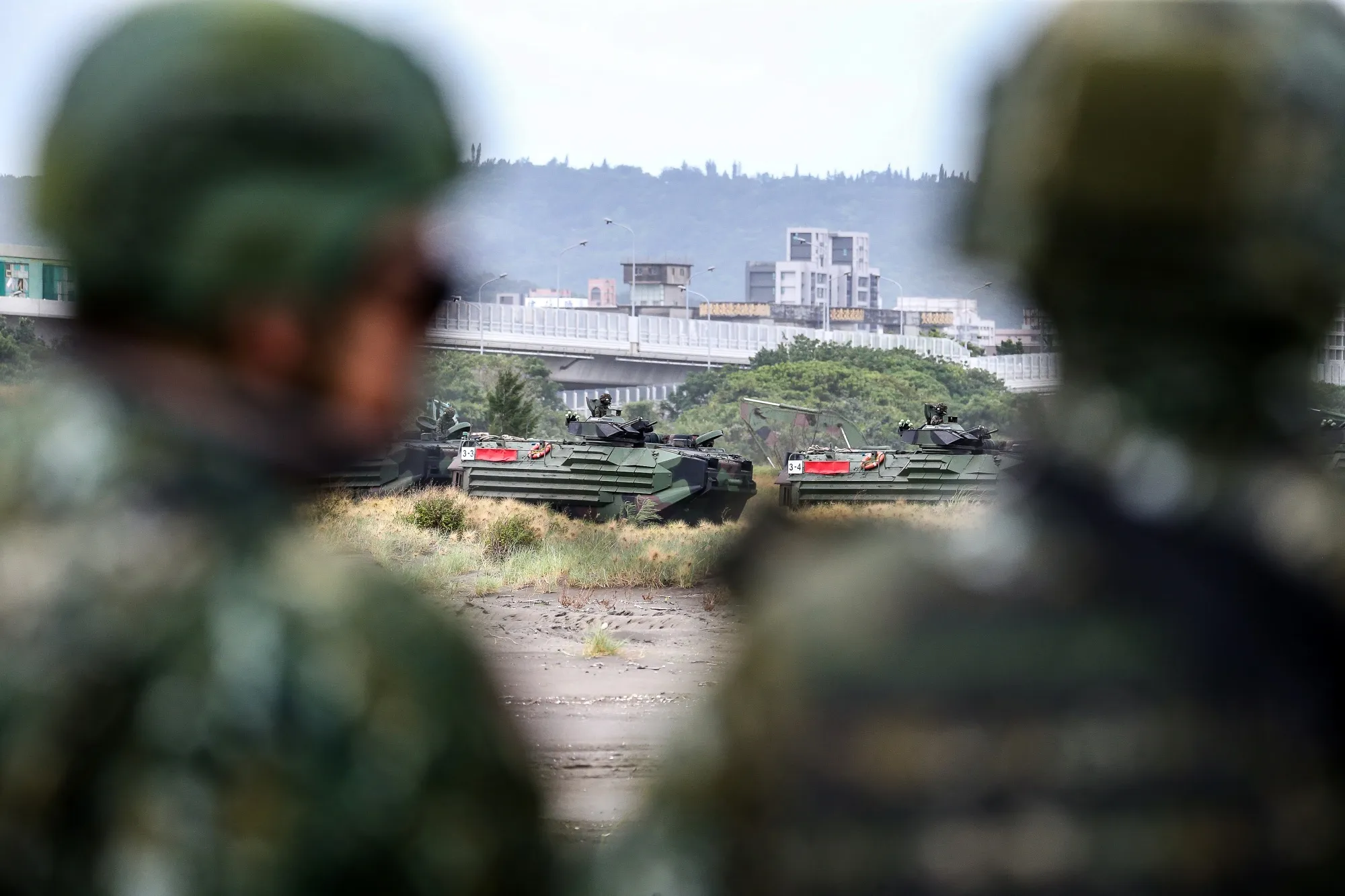 Assault amphibious vehicles on Bali beach during the Han Kuang military exercise in New Taipei City, Taiwan.