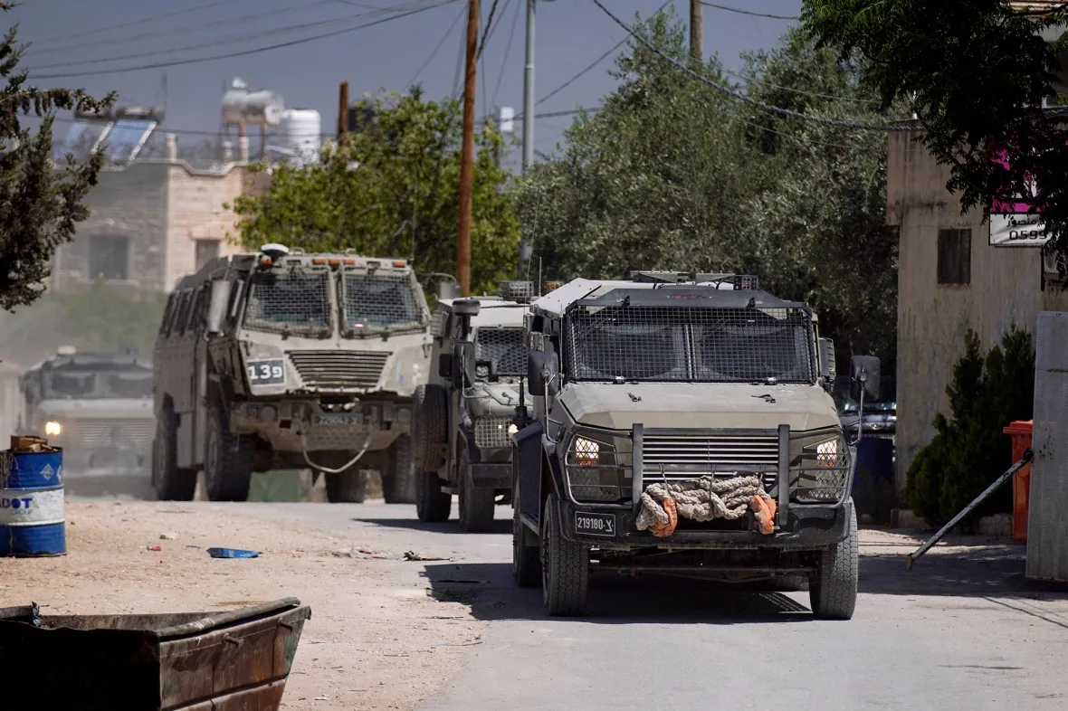Israeli army armoured vehicles enter Jenin during a military operation on May 21.