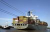 A ship laden with cargo containers prepares to leave the port of Buenos Aires, Argentina, in this November 28, 2003 photo. Argentina's trade surplus grew in February 2004 to its highest level in four months as manufacturers boosted output and shipments abroad.