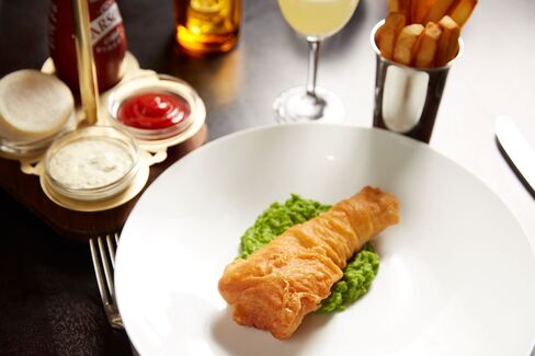 Fried cod on mushy peas, done right at The Clocktower.