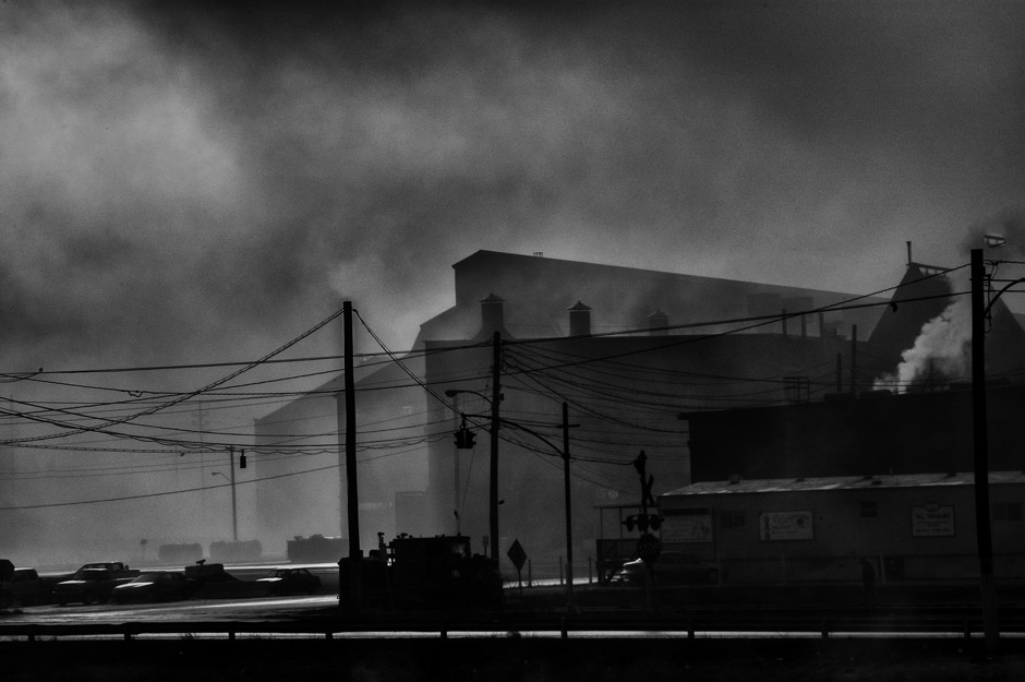 In the morning light, smoke from the Sparrows Point mills mingles with the fog. The steel mill outside of Baltimore closed in 2012.