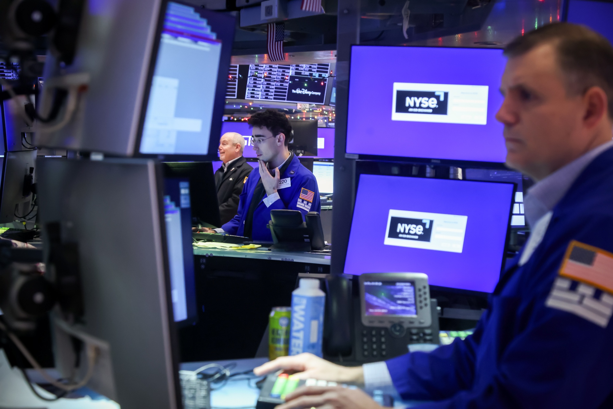Traders work on the floor of the New York Stock Exchange.