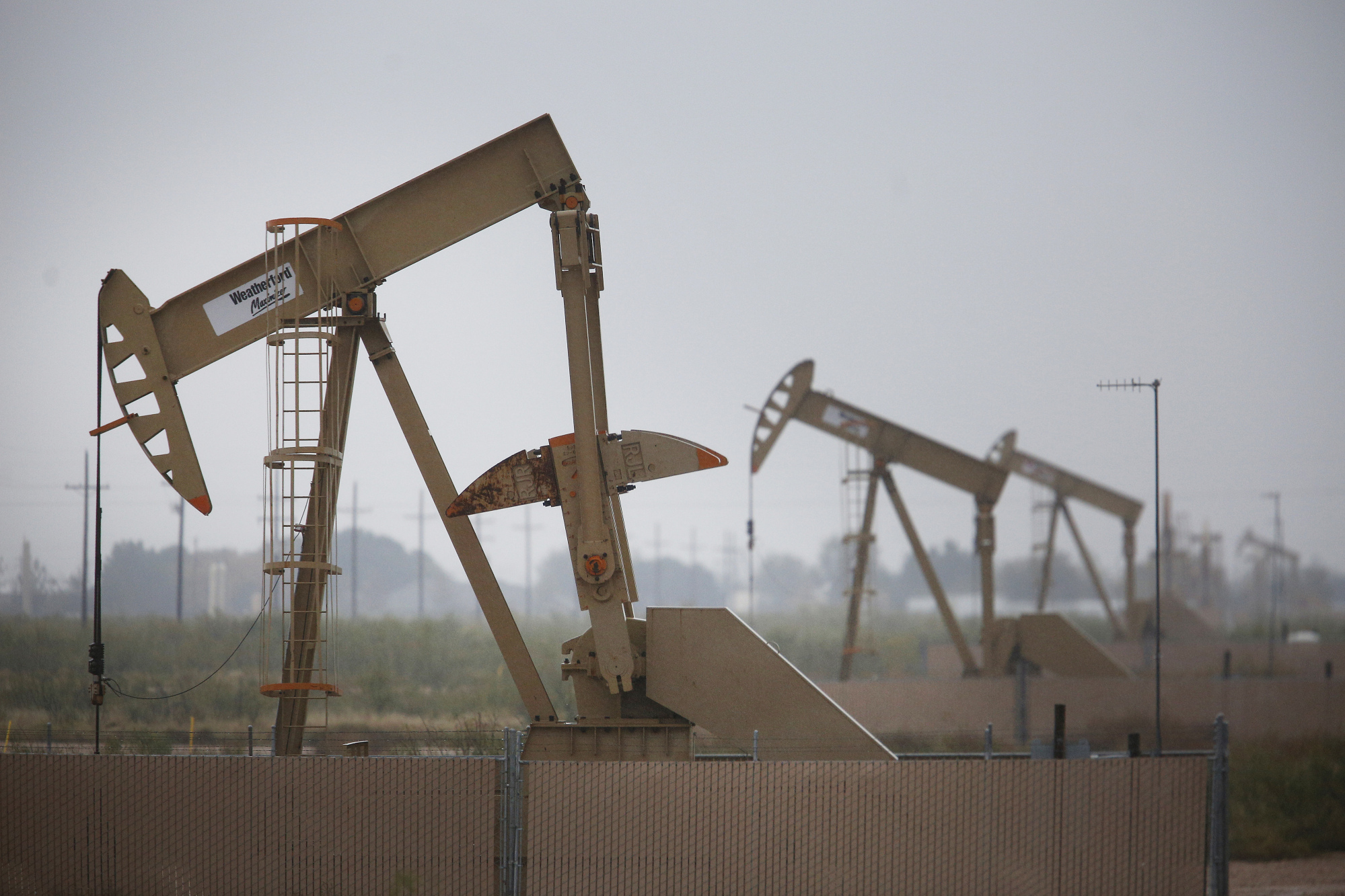 Oil pump jacks in the oil fields surrounding Midland, Texas.
