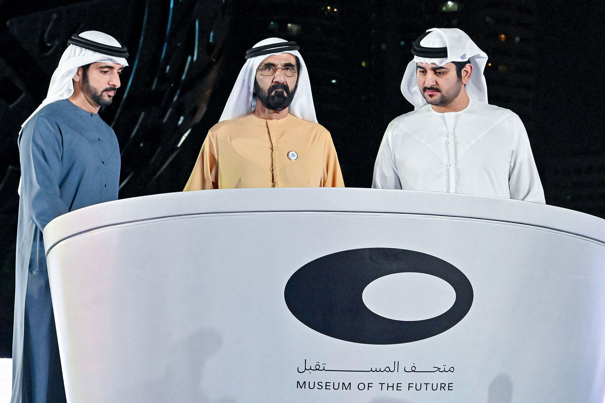 Ruler of Dubai, Sheikh Mohammed bin Rashid Al Maktoum, center, with his sons Crown Prince Sheikh Hamdan, left, and&nbsp;Sheikh Maktoum in Dubai on Feb. 22, 2022.