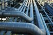 Woodside Shares Rise on Improved Dividend Even as Profit Drops
