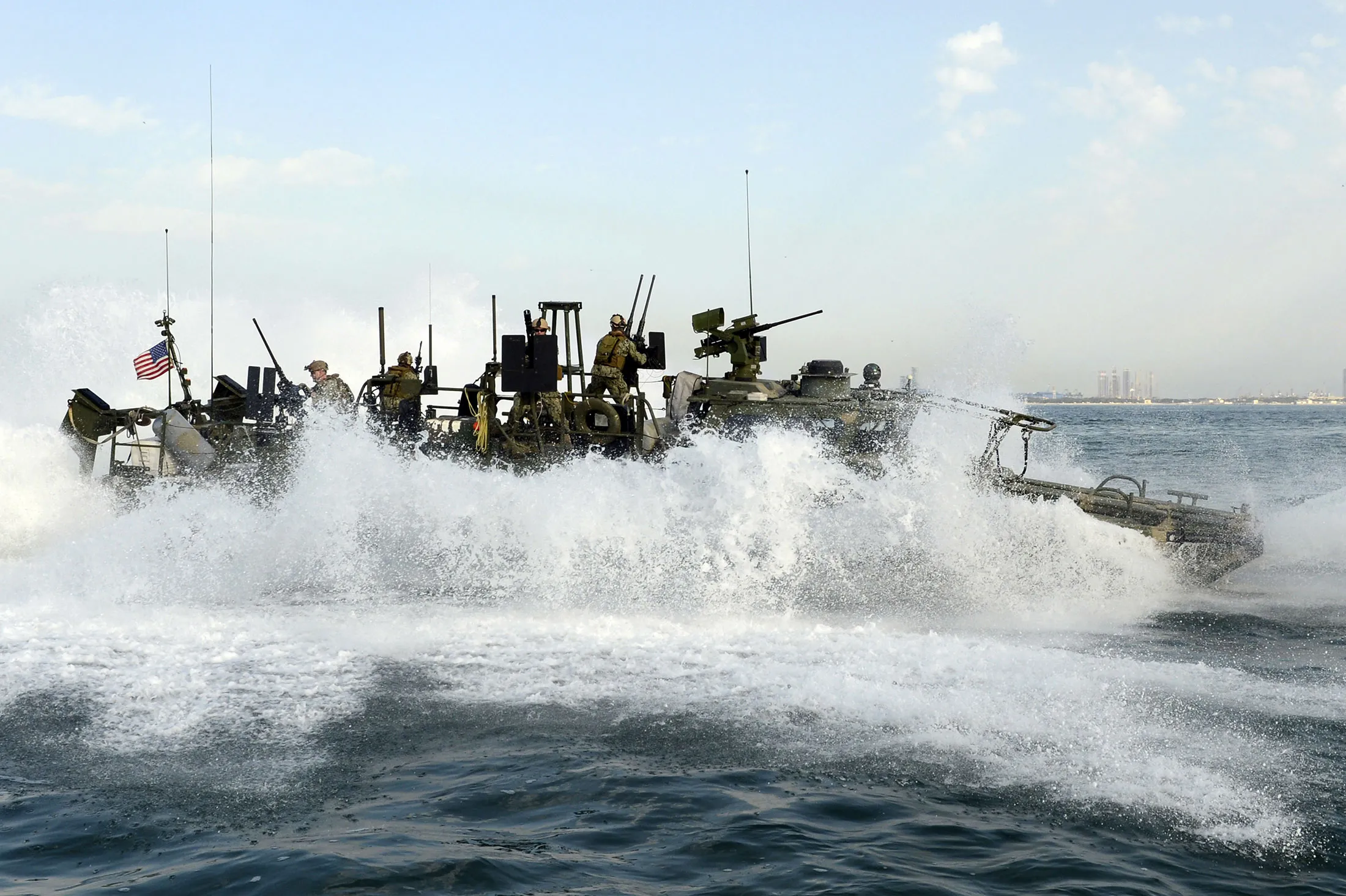 In this Feb. 23, 2013, photograph provided by the U.S. Navy, sailors assigned to Riverine Squadron (RIVRON) 2 perform an “E” stop while conducting patrol operations. Iran held 10 U.S. Navy sailors and their two boats, similar to the one in this picture.
