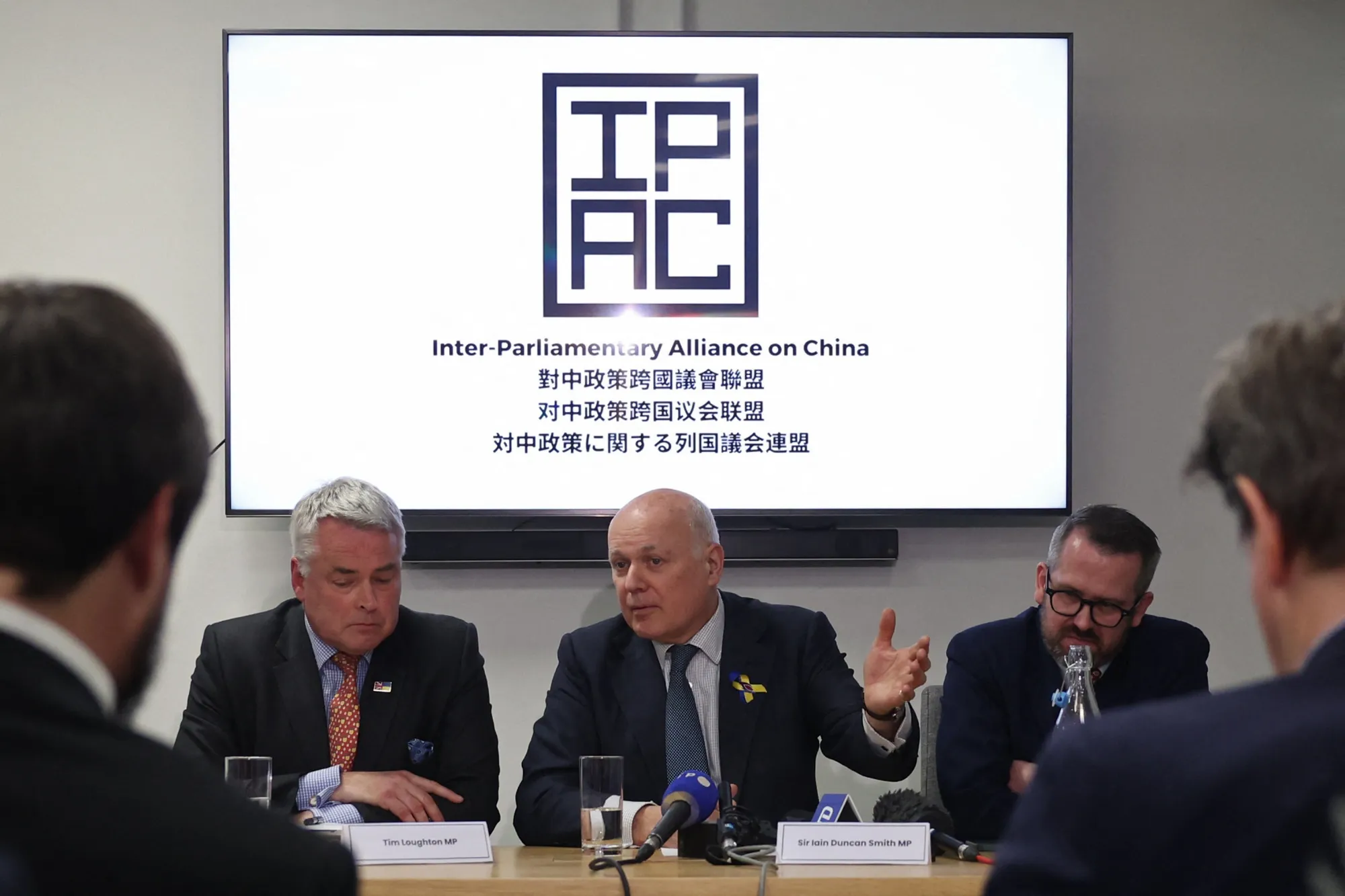 Conservative MP Tim Loughton, former Conservative leader, Iain Duncan Smith and SNP's former defense spokesman Stewart McDonald from the Inter-Parliamentary Alliance on China, hold a press conference in London on March 25, 2024.&nbsp;
