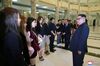 Kim Jong Un talks to South Korean artistic group, including the mebmers of the popular girl band Red Velvet.