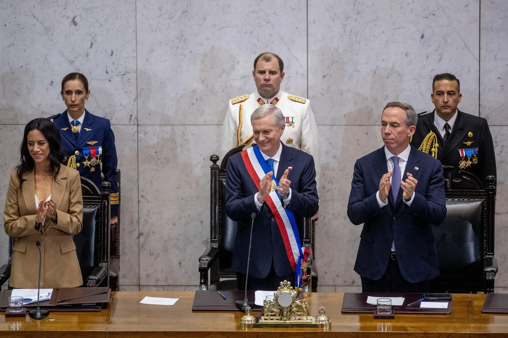 Chilean President&nbsp;Jose Antonio Kast,&nbsp;center, applauds during an inauguration ceremony at the National Congress in Valparaiso, Chile, on March 11.
