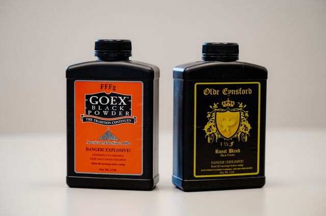 Cans of Goex traditional and premium black powder. 