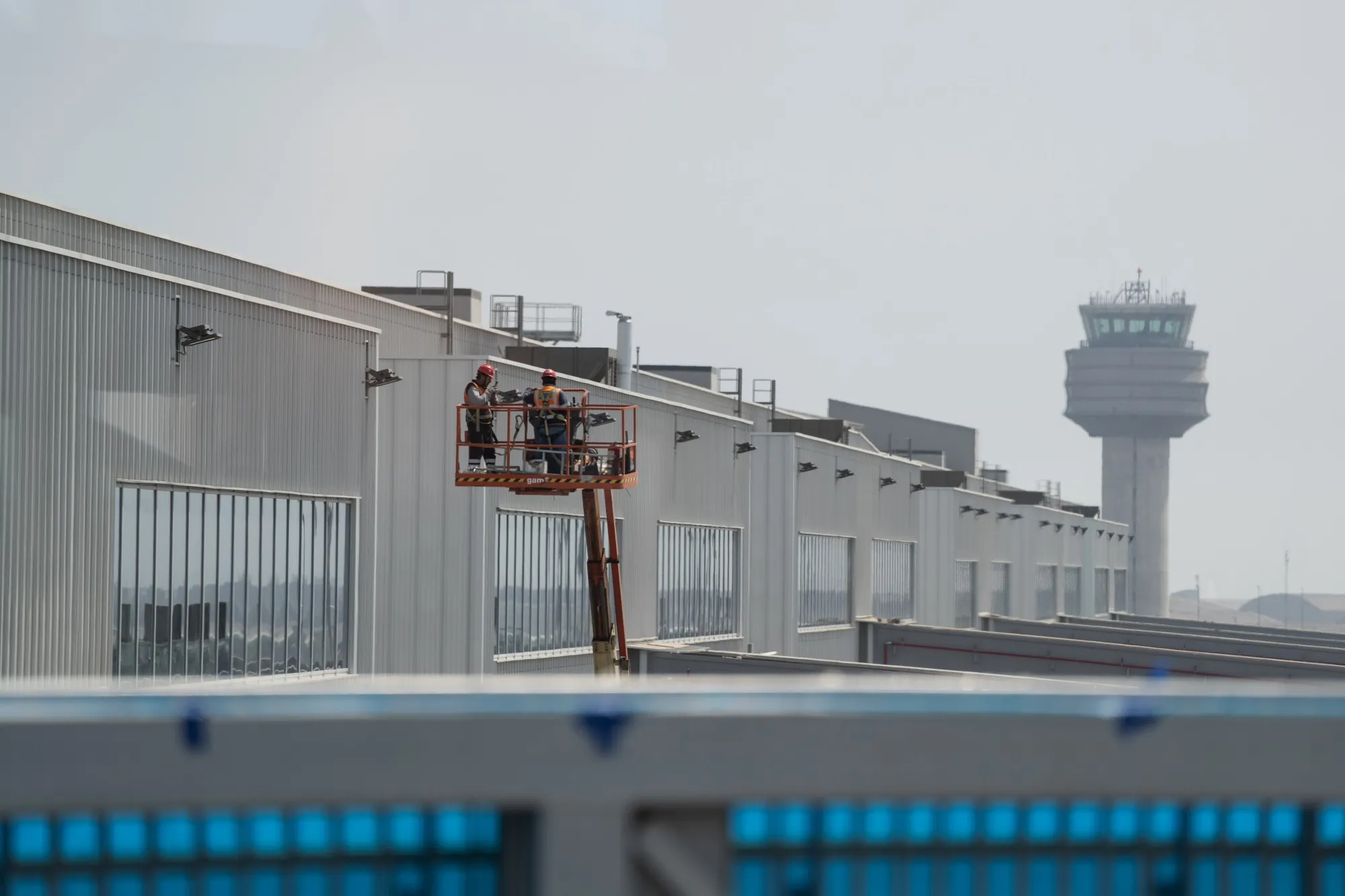 Workers finish construction at the new Jorge Chavez Airport in Lima.