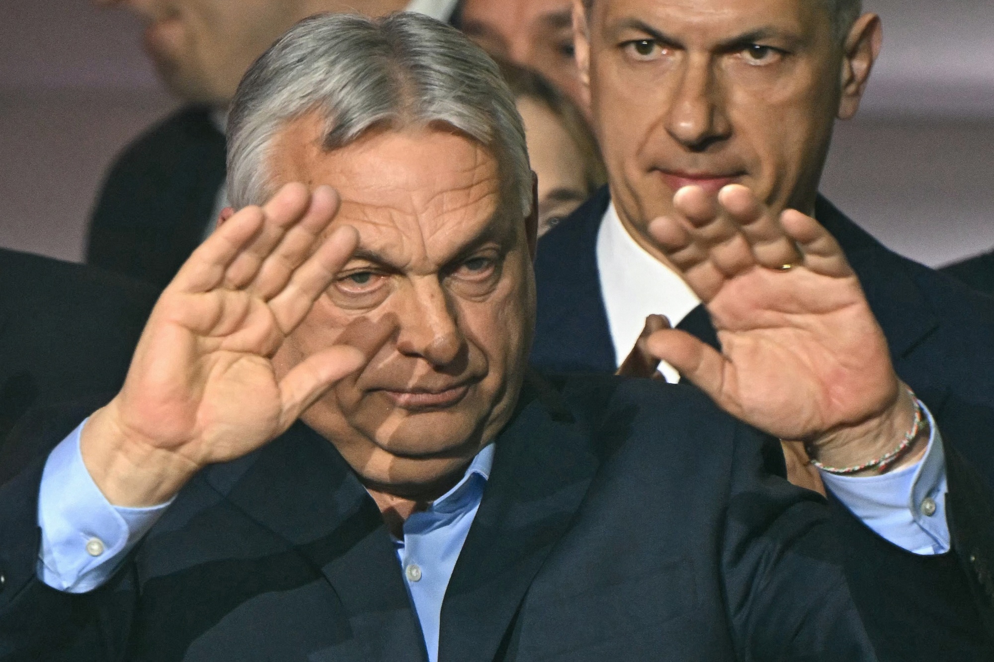 Viktor Orban waves to supporters at the Balna centre in Budapest during a general election in Hungary, on April 12, 2026. Photographer: Attila Kisbenedek/AFP/Getty Images