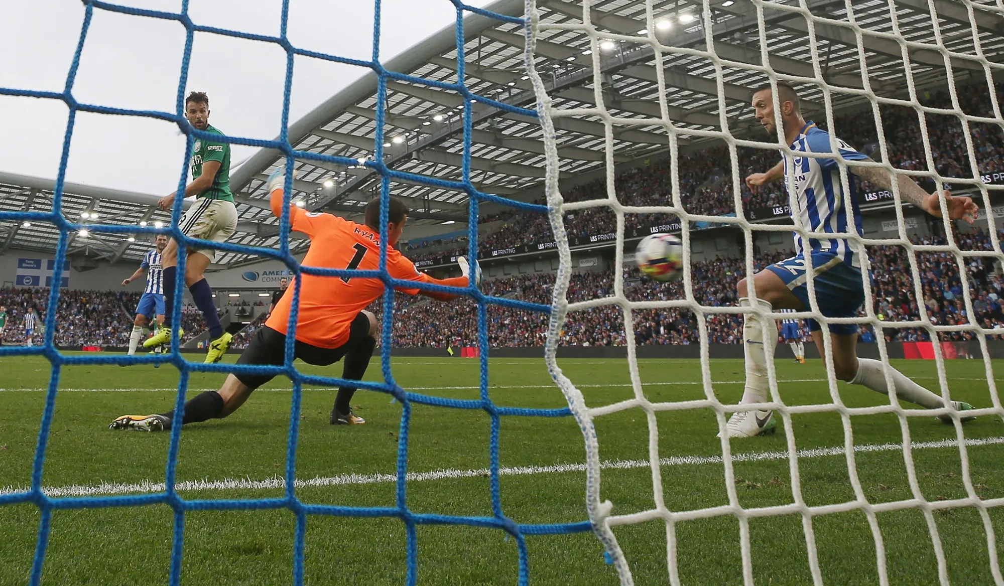 James Morrison of West Bromwich Albion scores his sides first goal past Mathew Ryan of Brighton and Hove Albion during the Premier League match between Brighton and Hove Albion and West Bromwich Albion at Amex Stadium on September 9, 2017 in Brighton, England.

