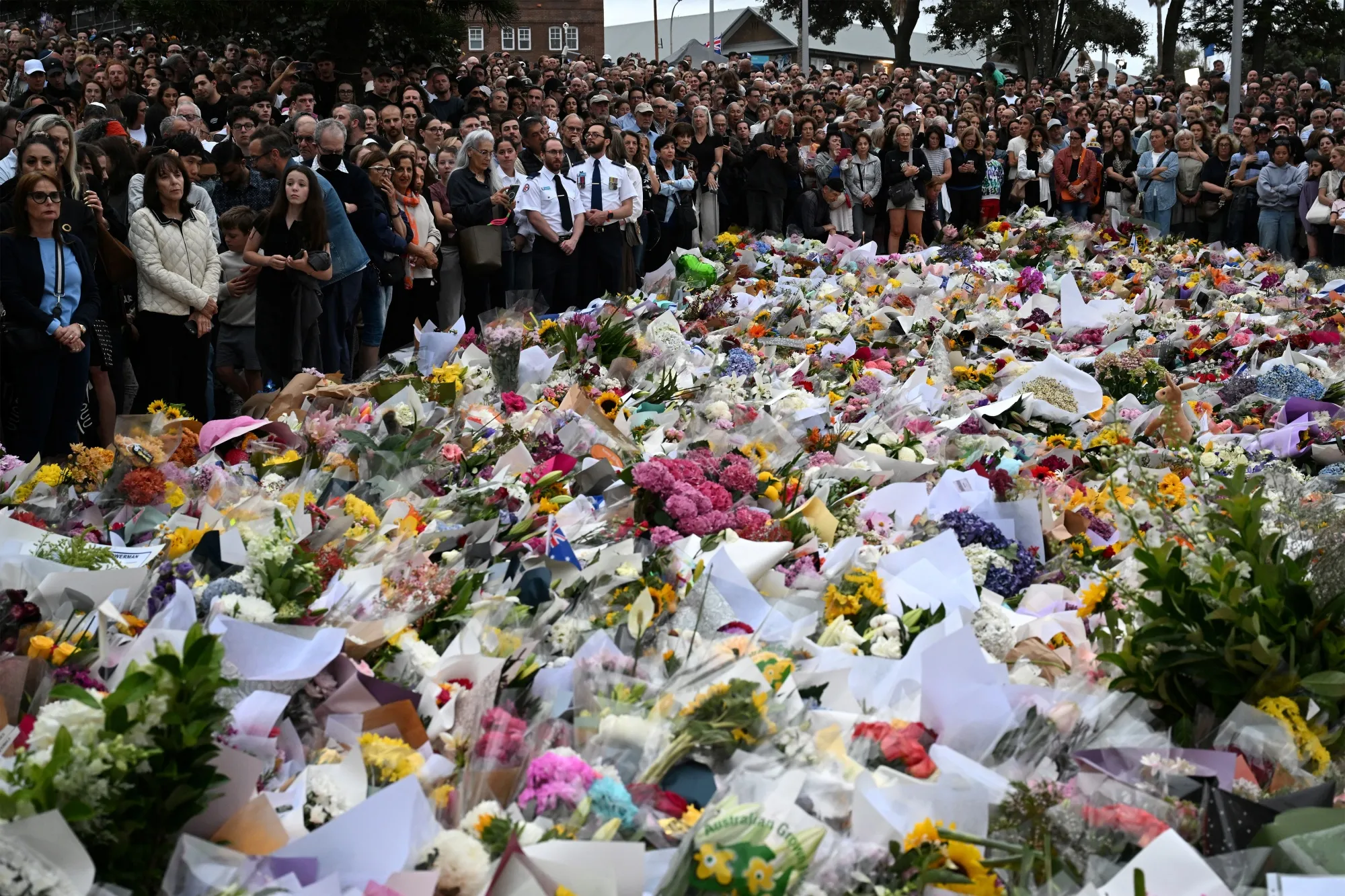 Mourners at the Bondi Pavilion at Bondi Beach in Sydney on Dec. 16.