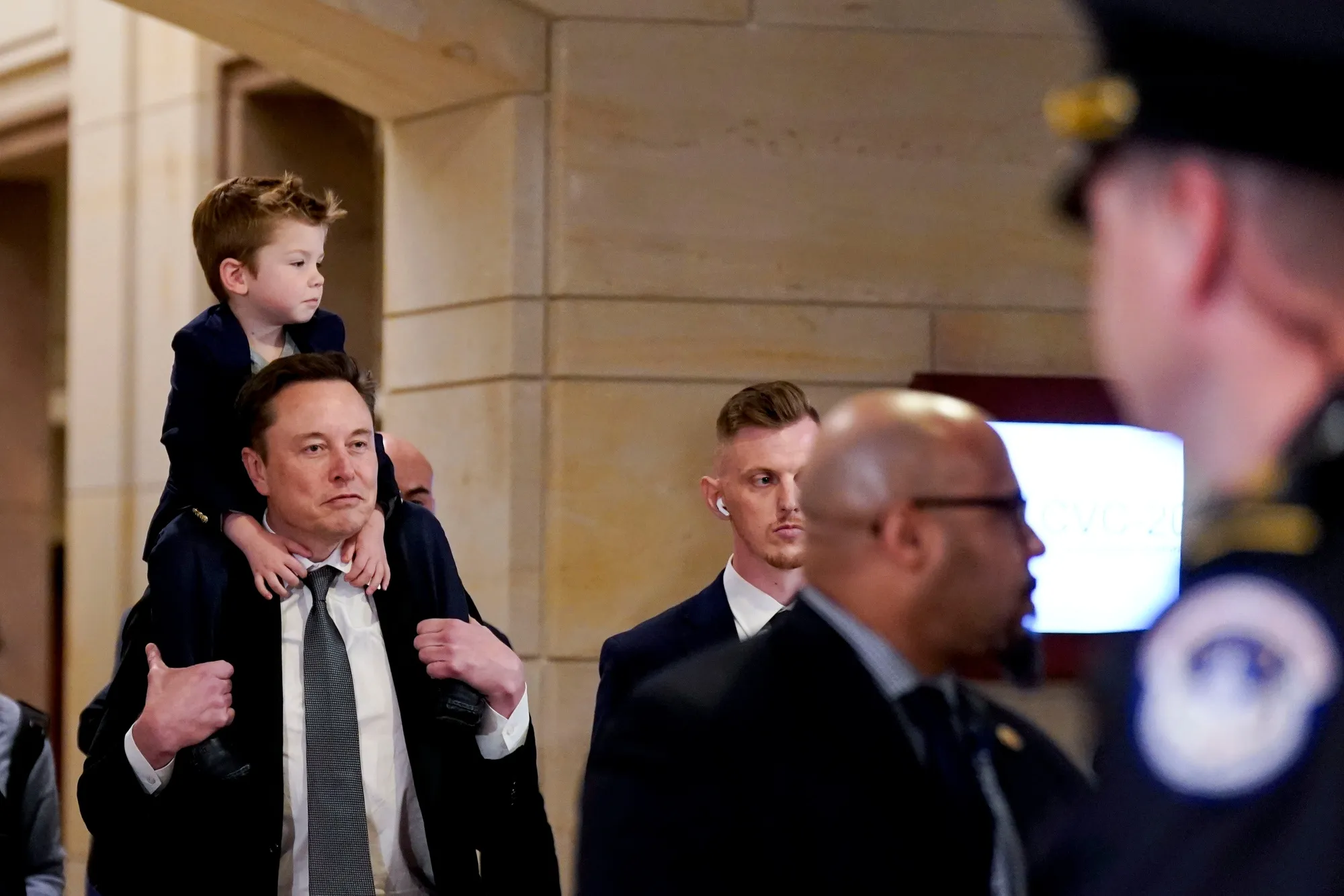 Elon Musk and his son at the Capitol, where the billionaire has been called “probably the most persuasive person roaming the halls.”&nbsp;