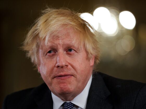 Johnson’s Authority Hit by Biggest U.K. Tory Revolt on Covid