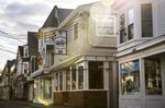 Stores stand along an empty street on Cape Cod in downtown Provincetown, Massachusetts, on April 22,.