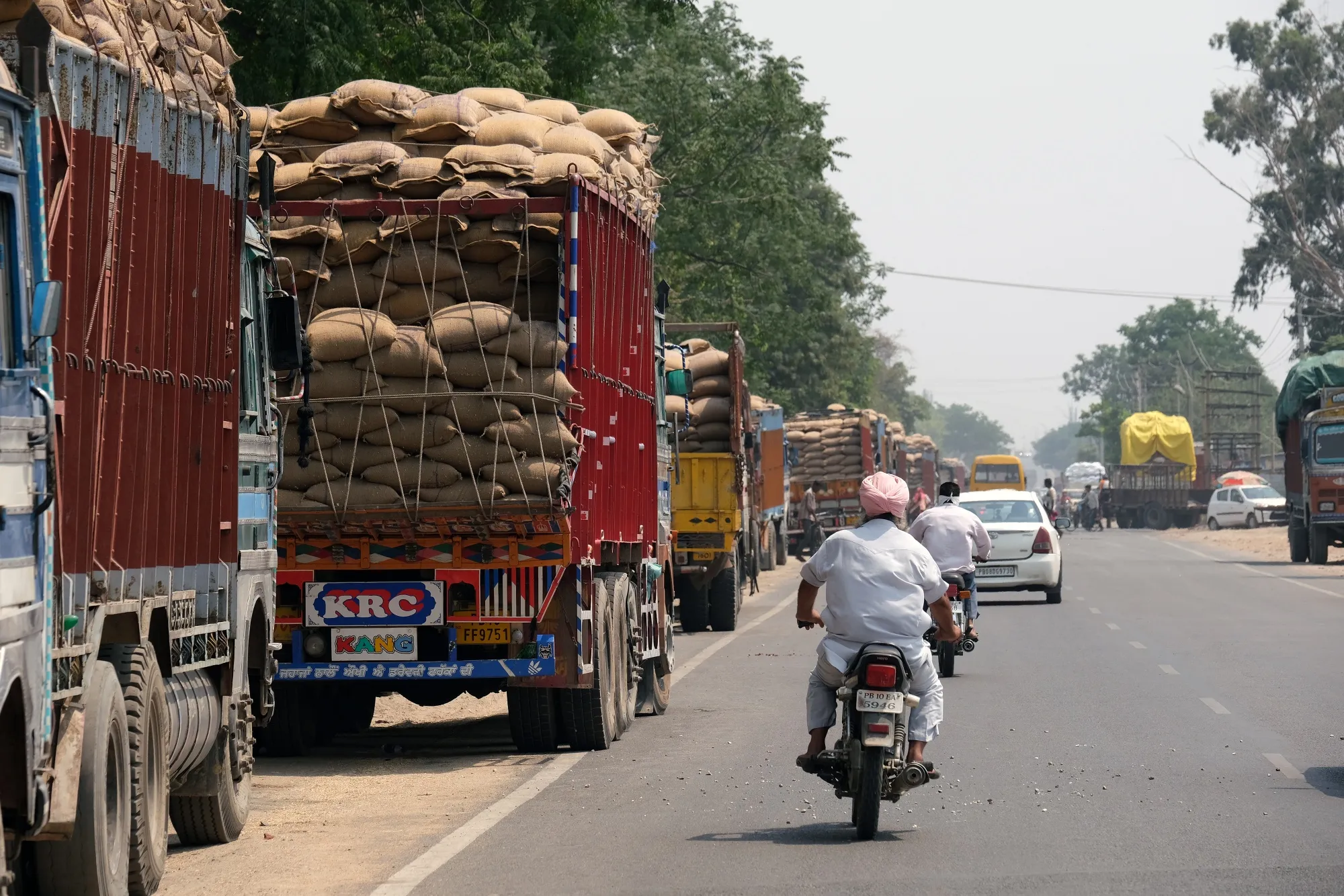 Loaded trucks along the road in&nbsp;Punjab.