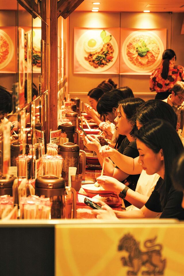 Eating Thai noodles in Shinjuku Station.