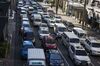 Cars stand in traffic during morning rush hour in the Makati district of Manila, the Philippines, on Tuesday, May 3, 2016. Once Asia's "sick man," the nation of 101 million people has earned World Bank praise as the continent's "rising tiger" under outgoing leader Benigno Aquino III, posting average six-year growth of 6.2 percent, the fastest since the 1970s.