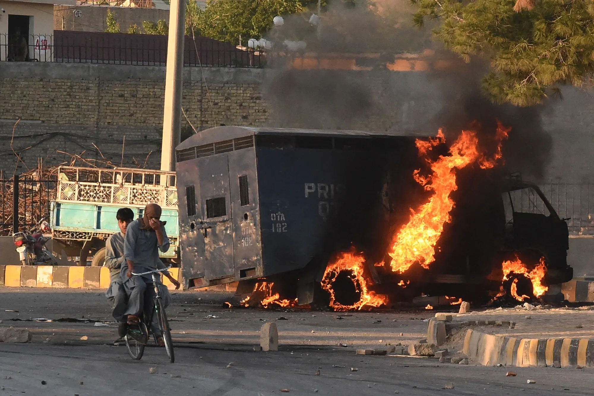 A burning police vehicle during a protest&nbsp;in Quetta on May 9.