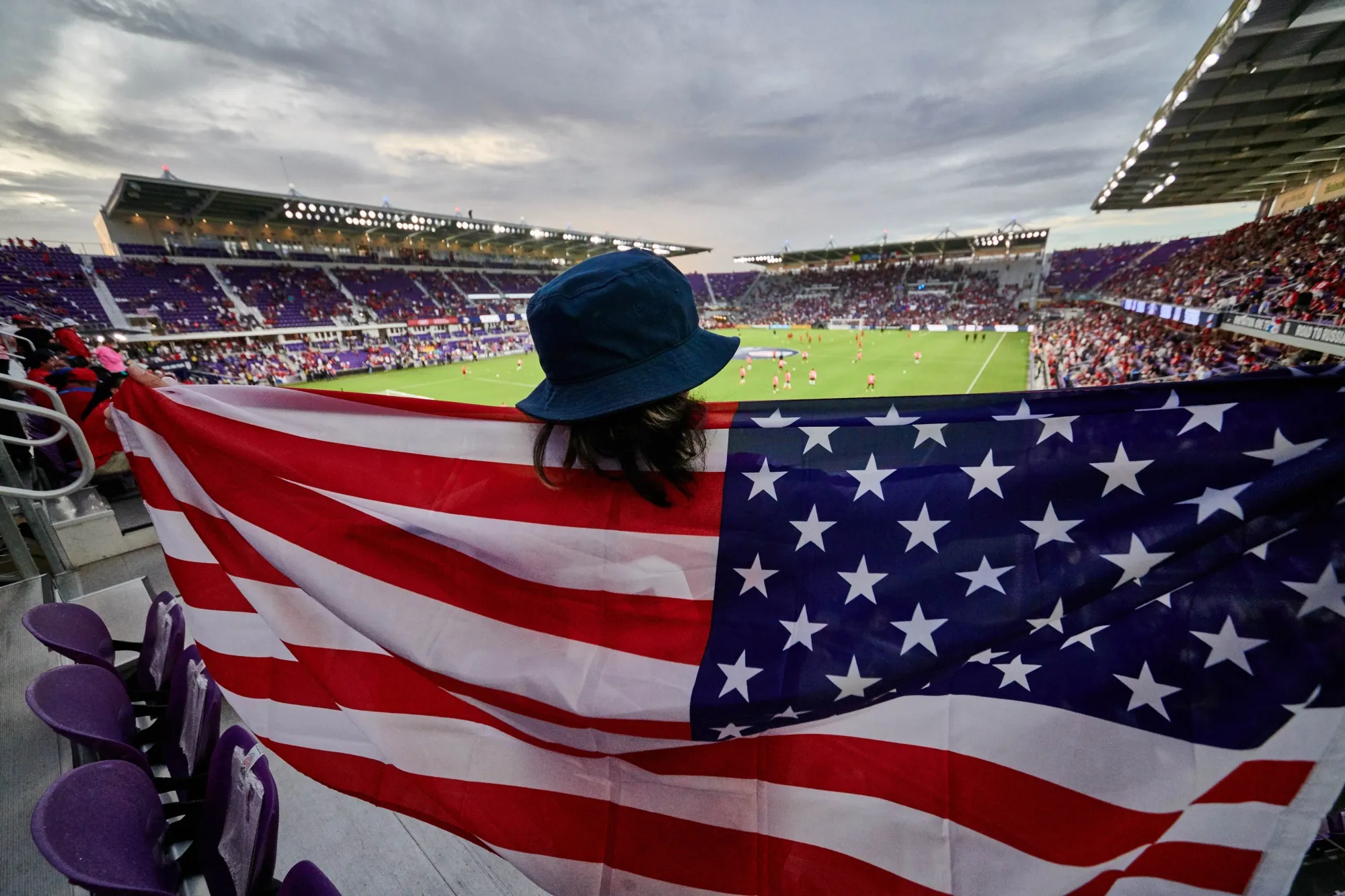 A fan holds up a US&nbsp;flag during the World Cup Qualifying match between the the US and Panama on Oct. 6, 2017.