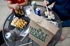 Customers eat lunch outside a Whole Foods Market Inc.