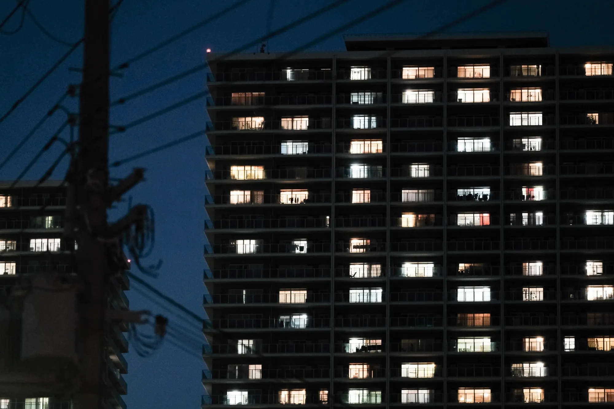 A residential building at night in Yao. Japan's government is urging residents to reduce electricity consumption as the unusual heat threatens to sap electricity supply.