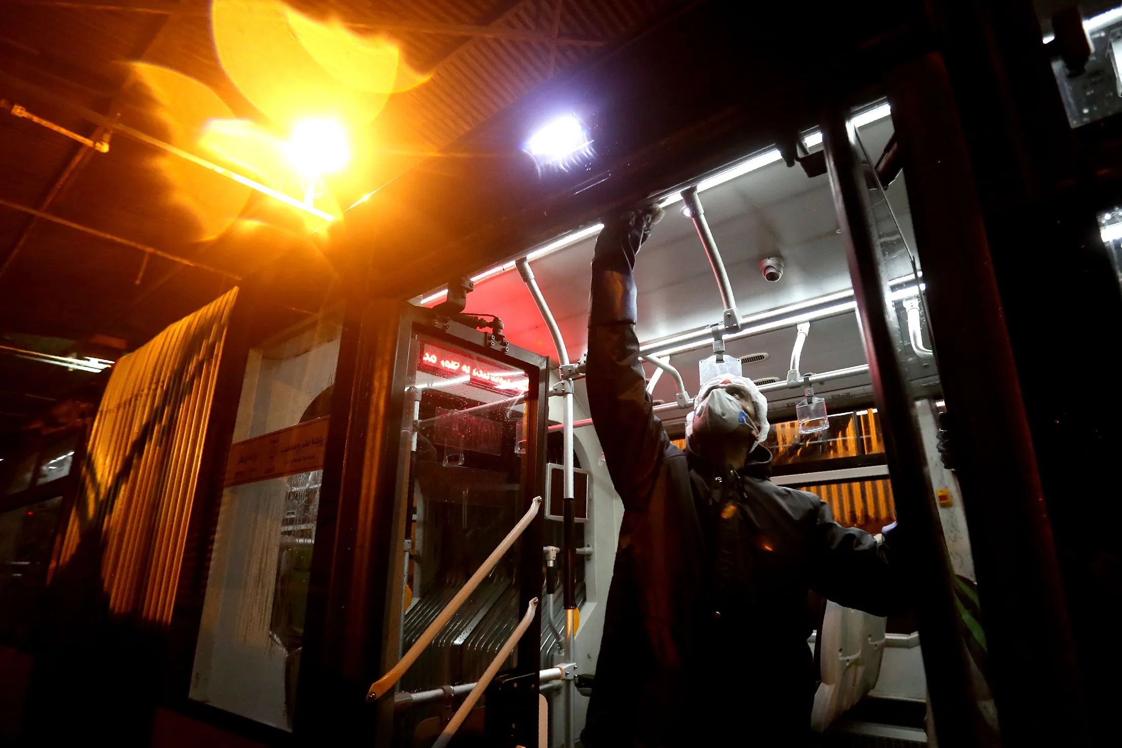 TOPSHOT-IRAN-VIRUS-HEALTH-TRANSPORT