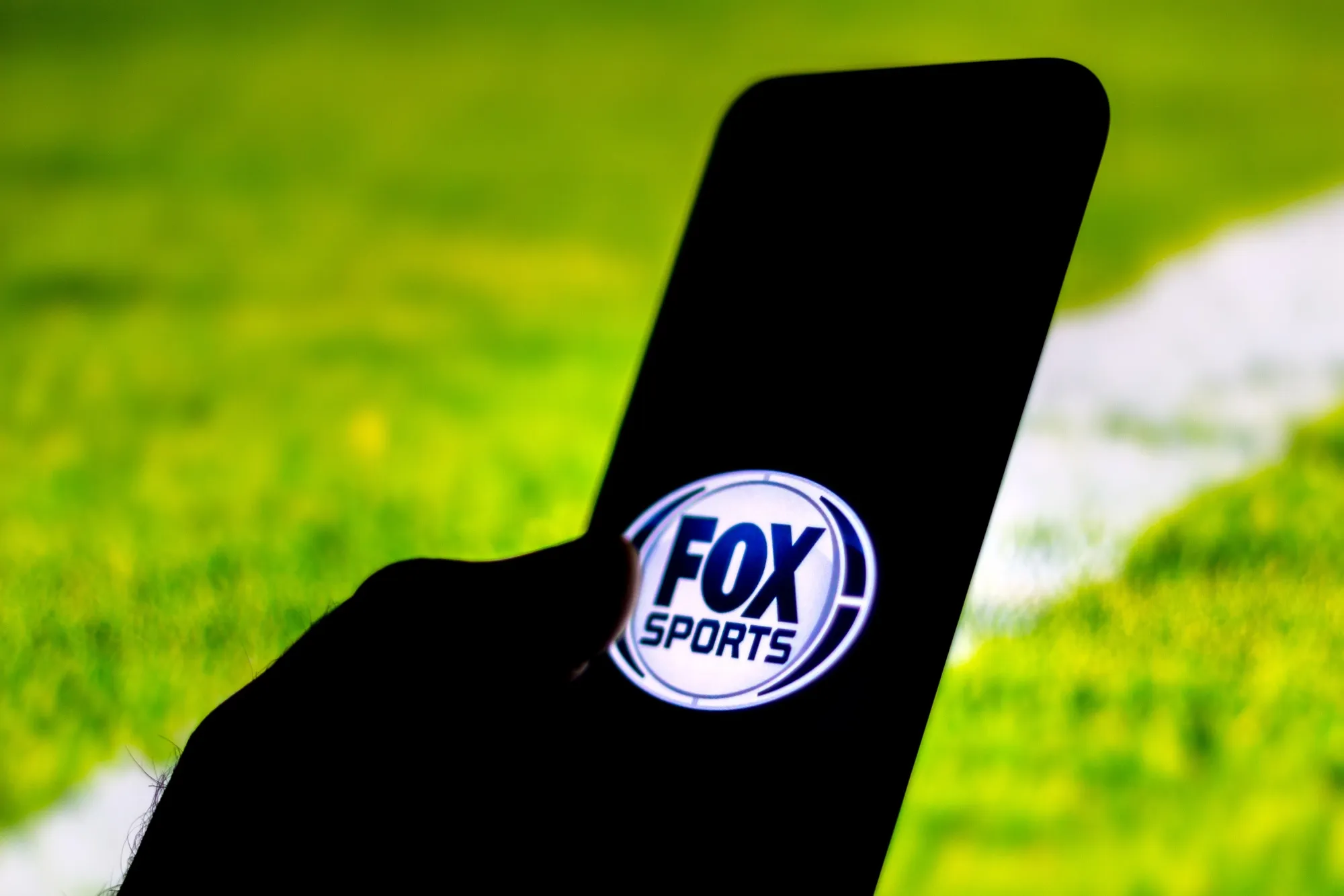 In this photo illustration the FOX Sports logo seen