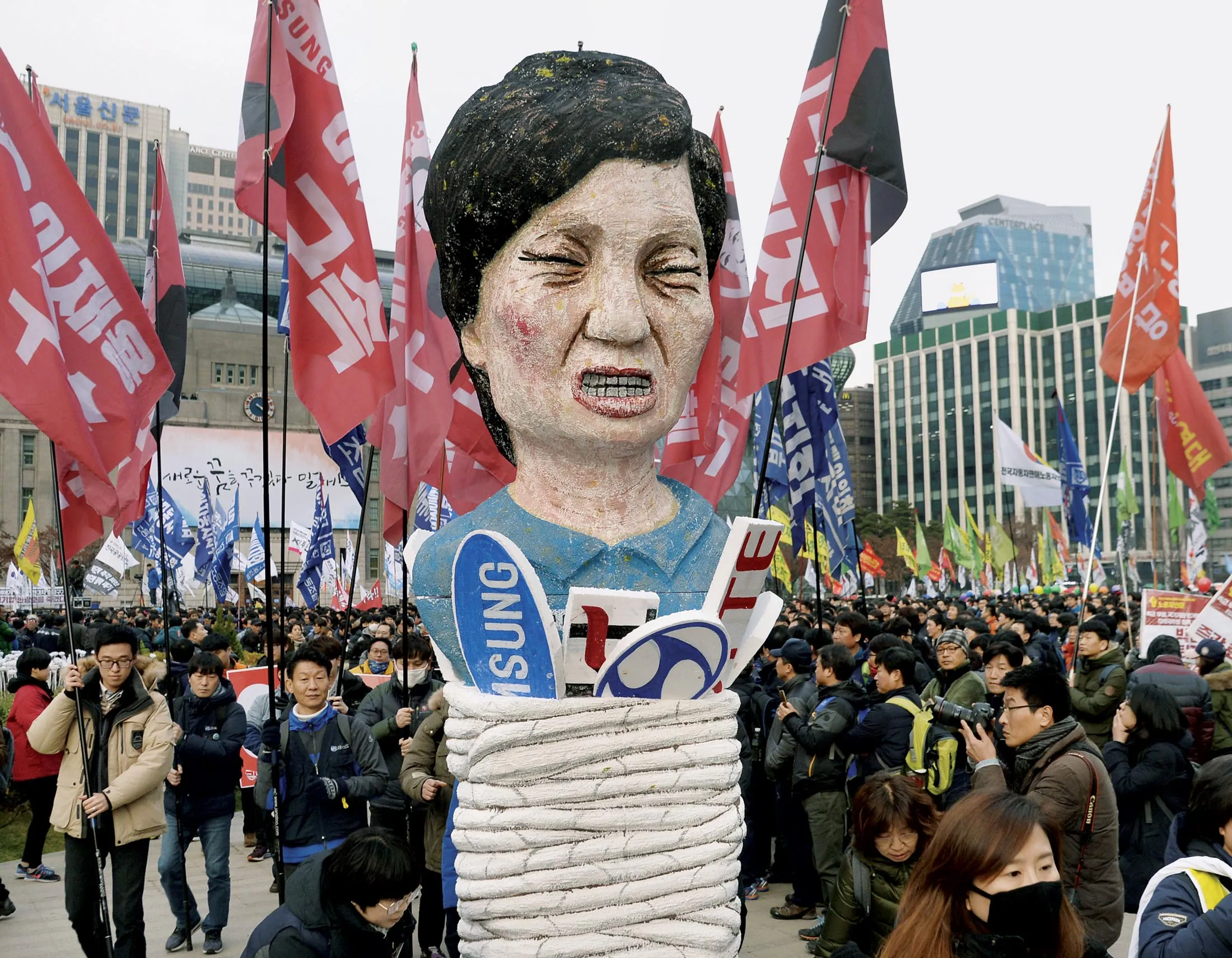 Protesters march in Seoul.
