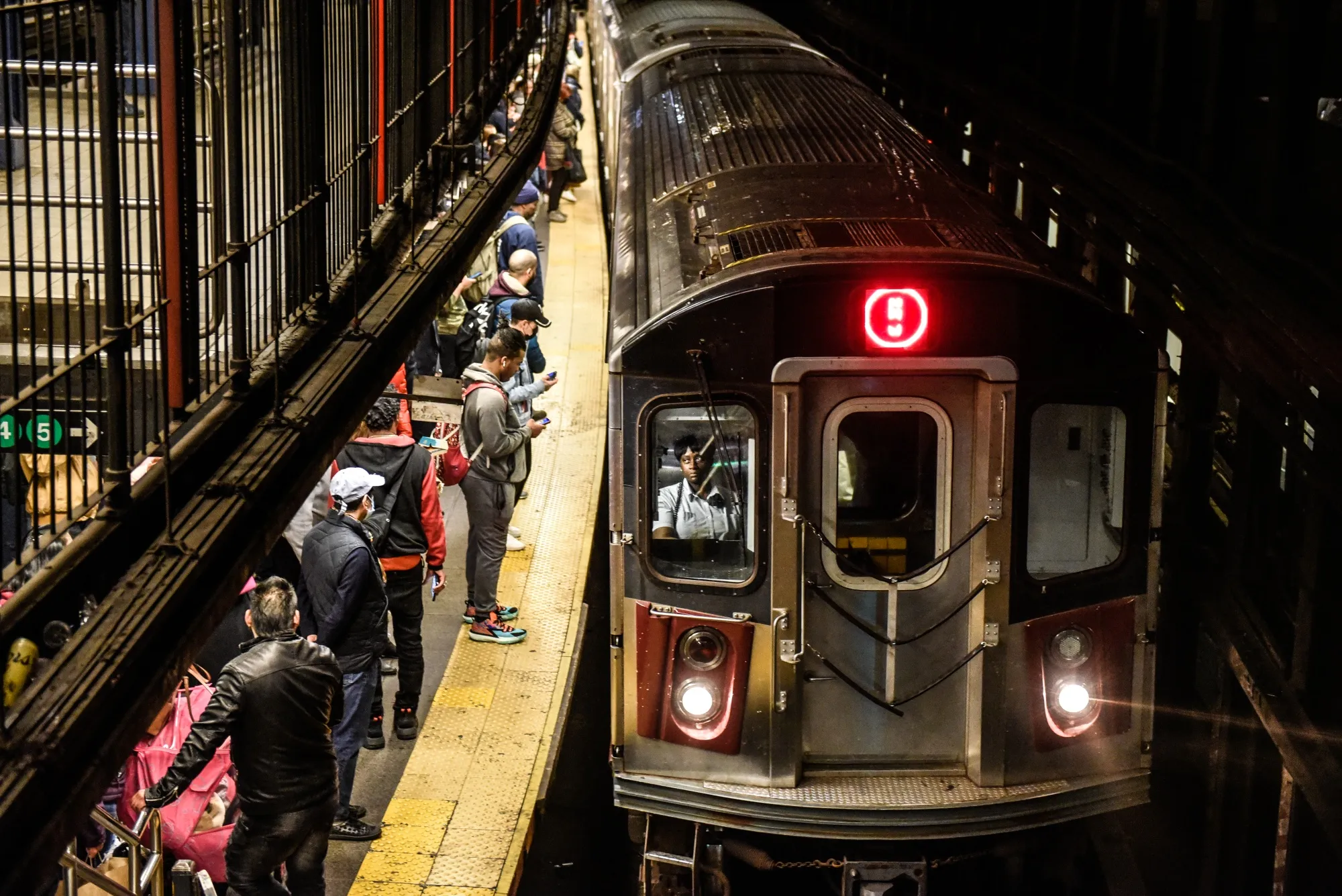 A subway train arrives at a station in New York.