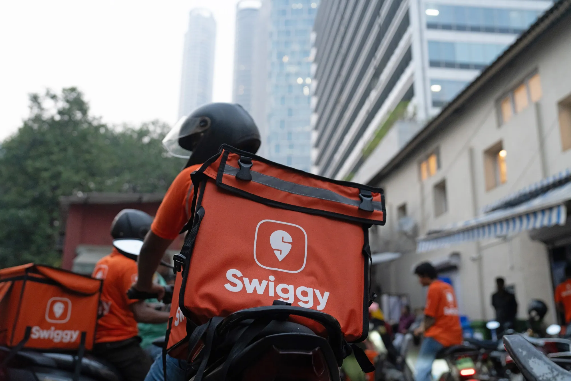 Swiggy Ltd. delivery workers in Mumbai, India.